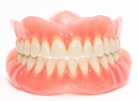 Dentures on white background