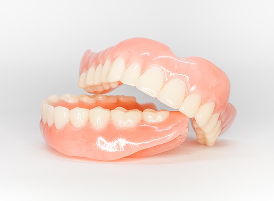 Two full dentures in Hanover lying on a flat surface